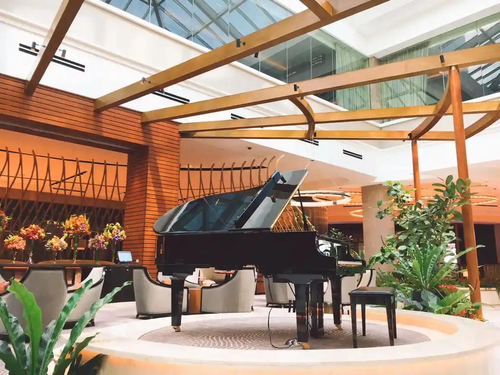 Elegant hotel lobby with grand piano